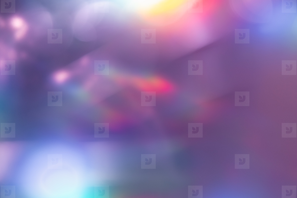 Soft colorful abstract background with blurred light reflections in purple  blue  and pink tones  creating a dreamy gradient texture