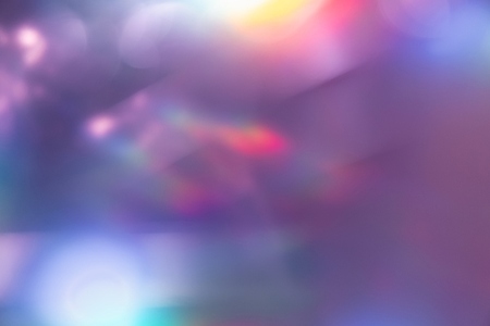Soft colorful abstract background with blurred light reflections in purple  blue  and pink tones  creating a dreamy gradient texture