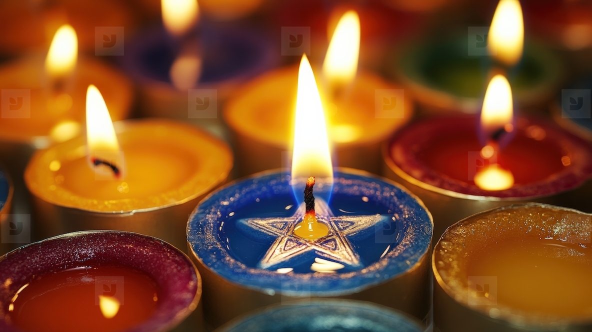 Colorful candles burning in festive arrangement create warm and inviting atmosphere