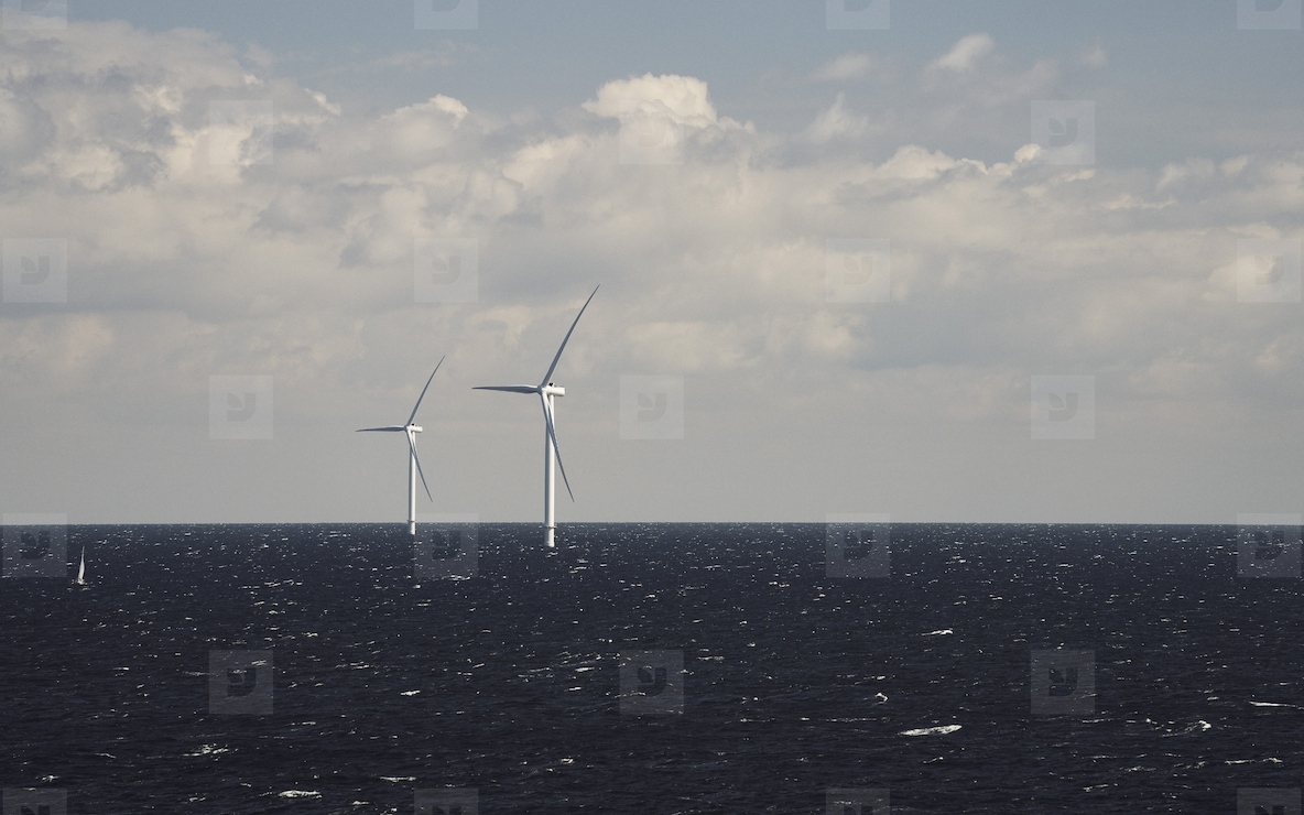 Offshore wind farm   wind turbines above surface of ocean