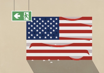 Emergency exit sign hanging over damaged American flag