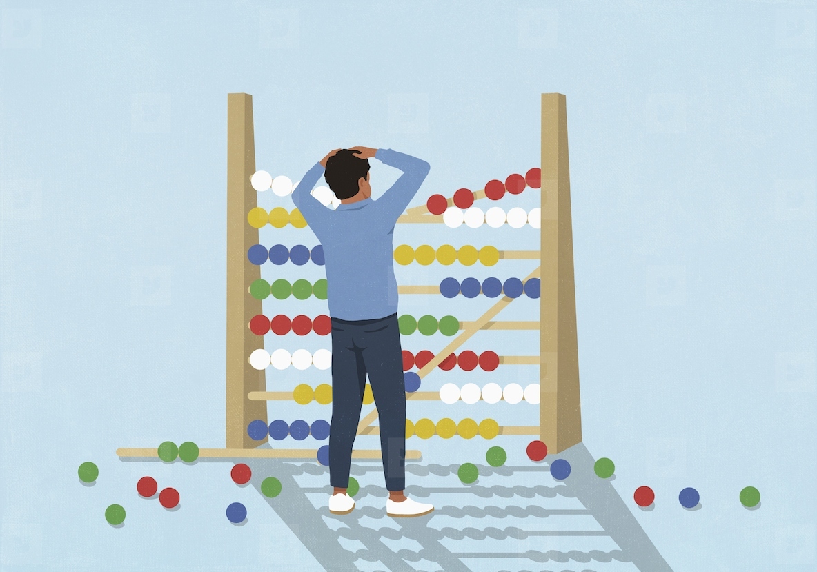 Surprised man watching beads fall from large