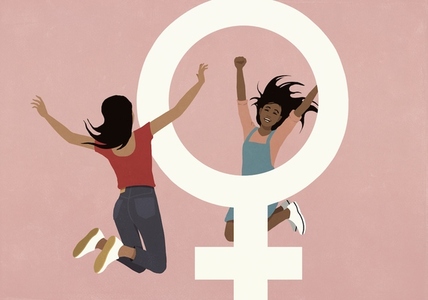 Carefree young women jumping for joy around female symbol