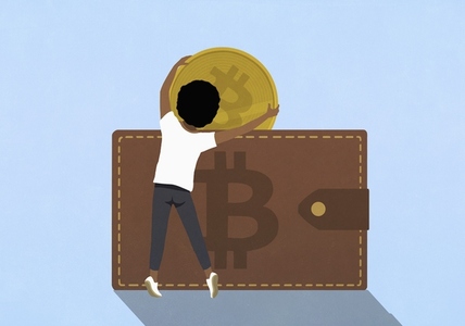 Man placing Bitcoin into large wallet
