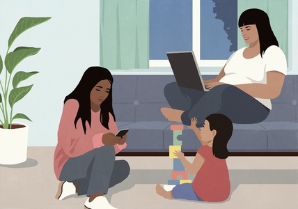 Multiracial females using laptop smart phone and playing with toy blocks Multiracial females using laptop smart phone and playing with toy blocks