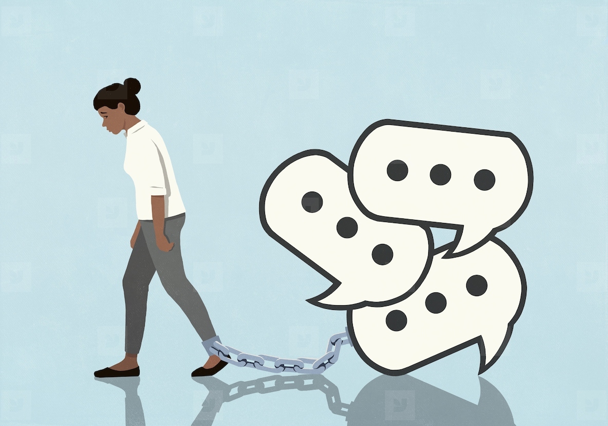 Text message speech bubbles shackled to womans ankle