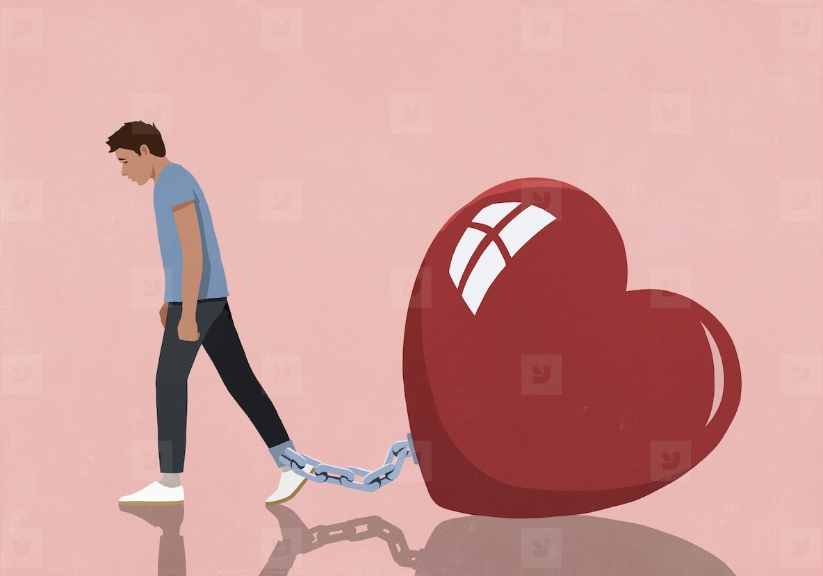 Large red heart shackled to ankle of dejected man