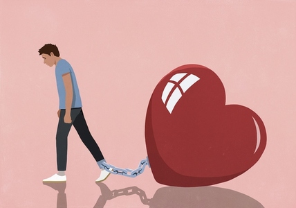 Large red heart shackled to ankle of dejected man Large red heart shackled to ankle of dejected man