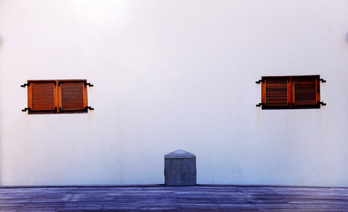 Two Windows On A White Wall