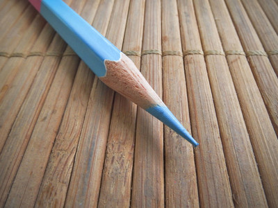 Pencil on bamboo pad background