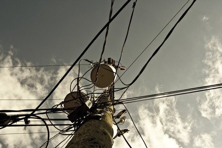 Telephone pole and clouds