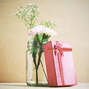 Flower with red present box