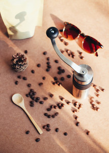 Coffee grinder and sunglasses