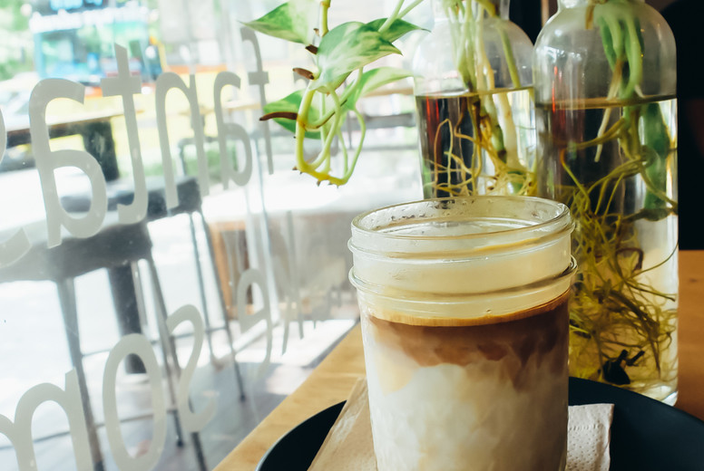 Iced coffee in hipster cafe