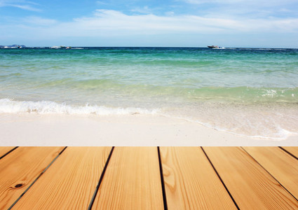 wooden table over sea background