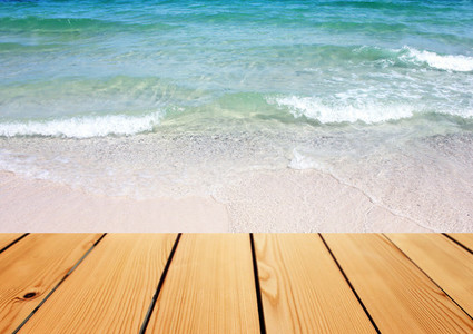 wooden table over sea background