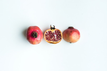 Ripe pomegranate with half