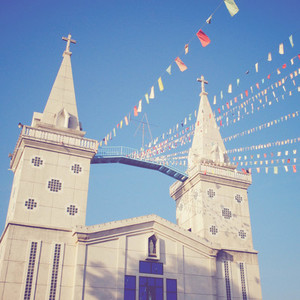 Colorful flags with a church