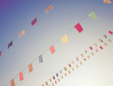 Colorful bunting flags on sky