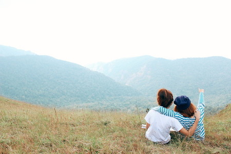 Couple overlooking autumn valley