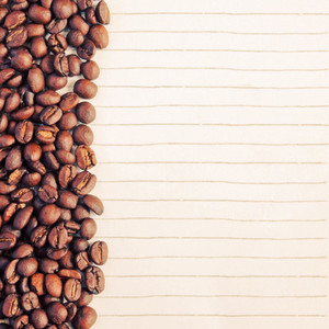 Coffee beans and paper