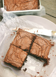 cutting crispy homemade brownie
