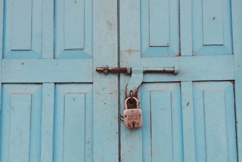 Lock on blue wooden door