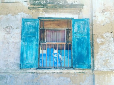 Old wooden blue window
