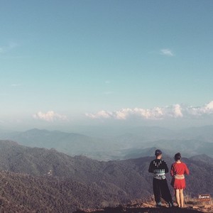 Couple standing on the peak