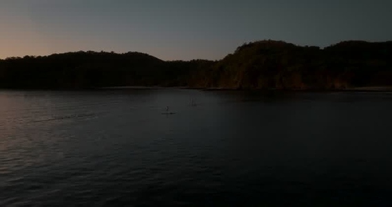 People Paddleboarding   sunset