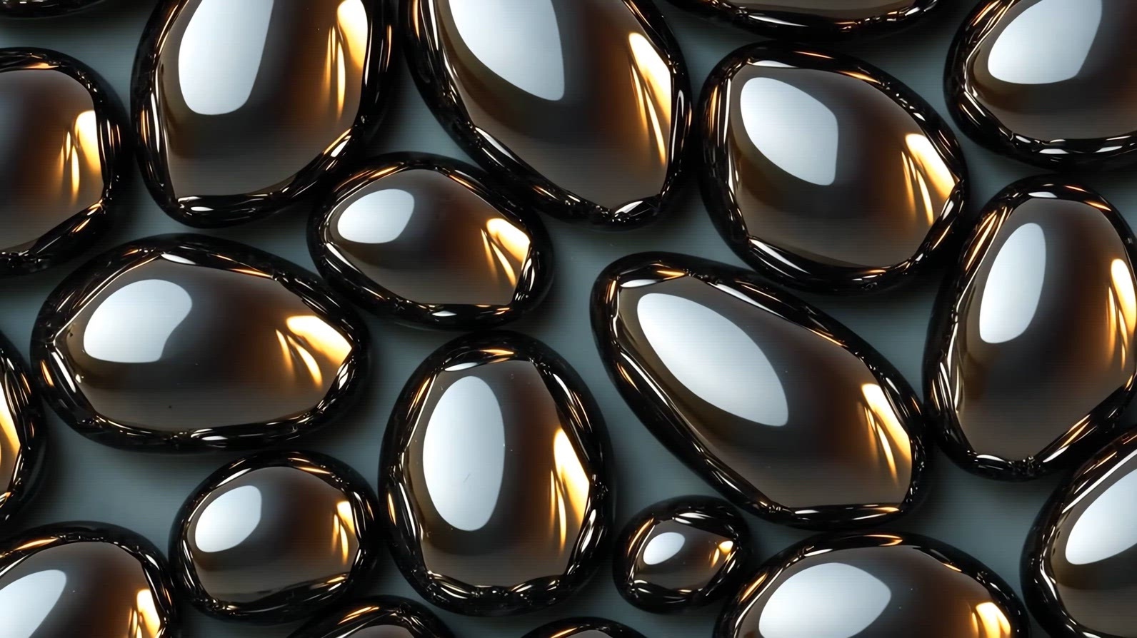 Gold Obsidian smooth, glossy black stones reflective surface