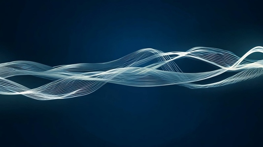 Abstract light waves flowing across a dark blue background