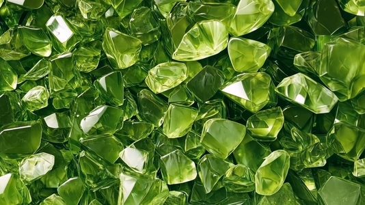 A close up view of shiny green Olivine glass stones
