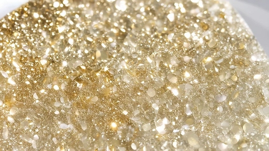 Close up of sparkling golden Rutilated Quartz crystals or gem