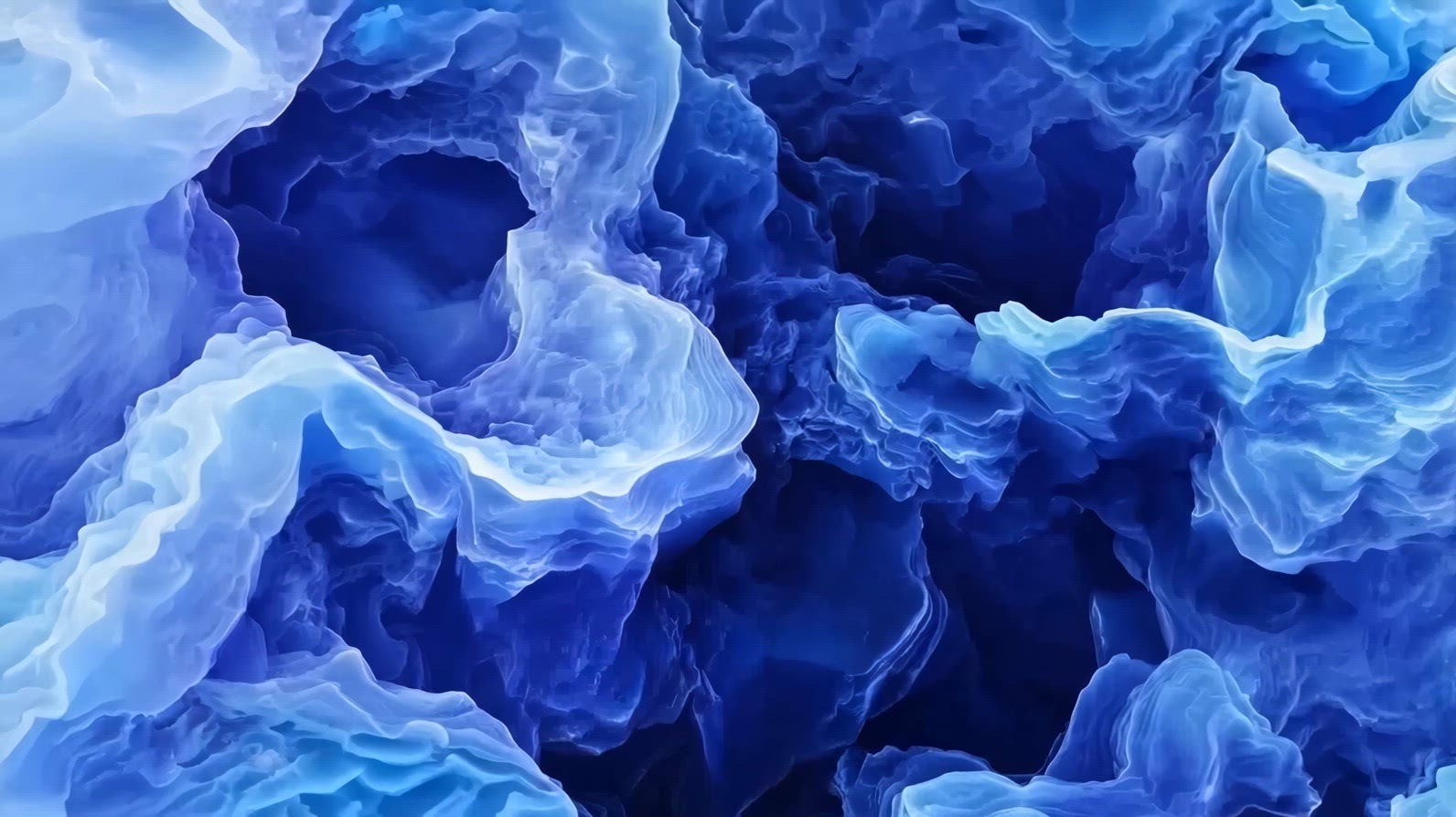 Close-up view of vibrant blue and turquoise Sodalite crystalline