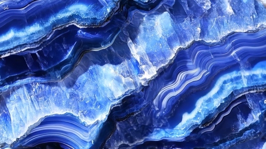 A close up view of a blue Sodalite agate stone