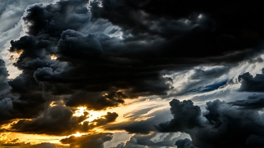 Dramatic clouds in various shades of gray and black