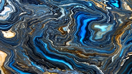 A close up view of a beautifully patterned agate stone