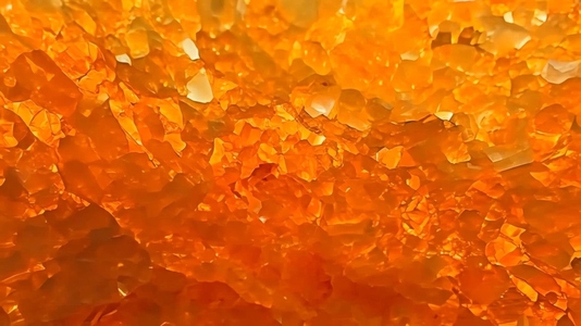 Close up view of vibrant orange crystals
