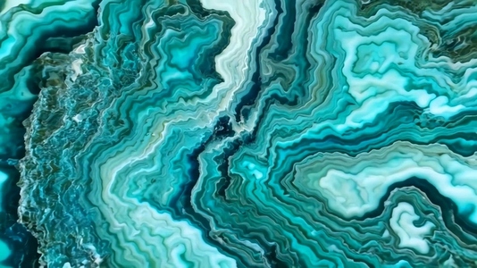 An abstract close up of agate stone with swirling patterns