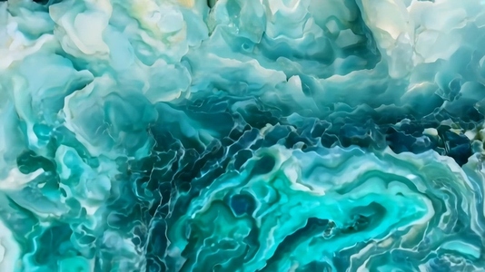 A close up view of a vibrant turquoise agate stone