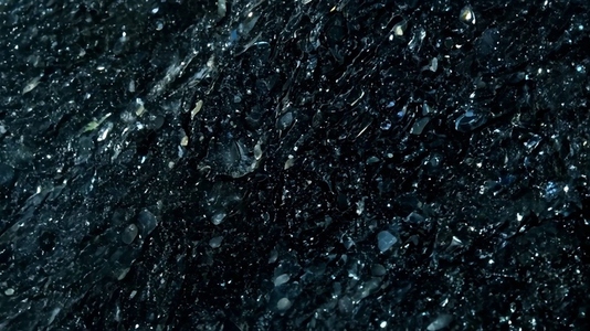 A close up view of a South Onyx textured surface resembling dark
