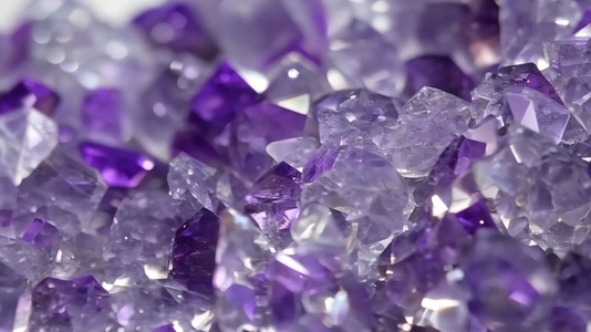 Close up of purple and clear Sugilite amethyst crystals