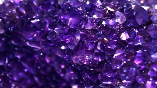 Close up of a cluster of purple Sugilite amethyst crystals