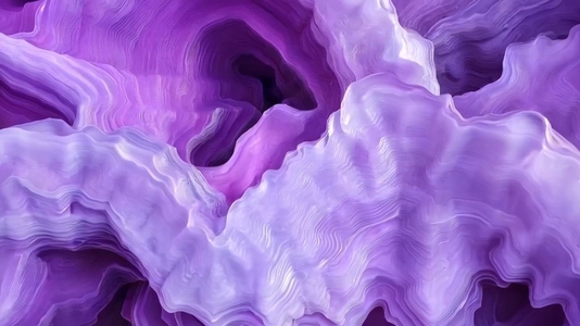 An abstract close up of swirling purple and lavender textures