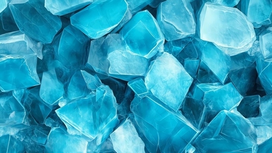 Various turquoise and clear ice cubes stacked together