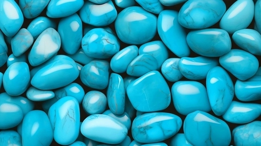 Smooth  polished turquoise stones arranged randomly