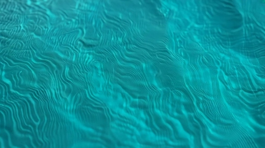 Rippling turquoise water  showcasing intricate patterns
