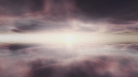 Flying Into the Sunset Through Clouds Flying Into the Sunset Through Clouds