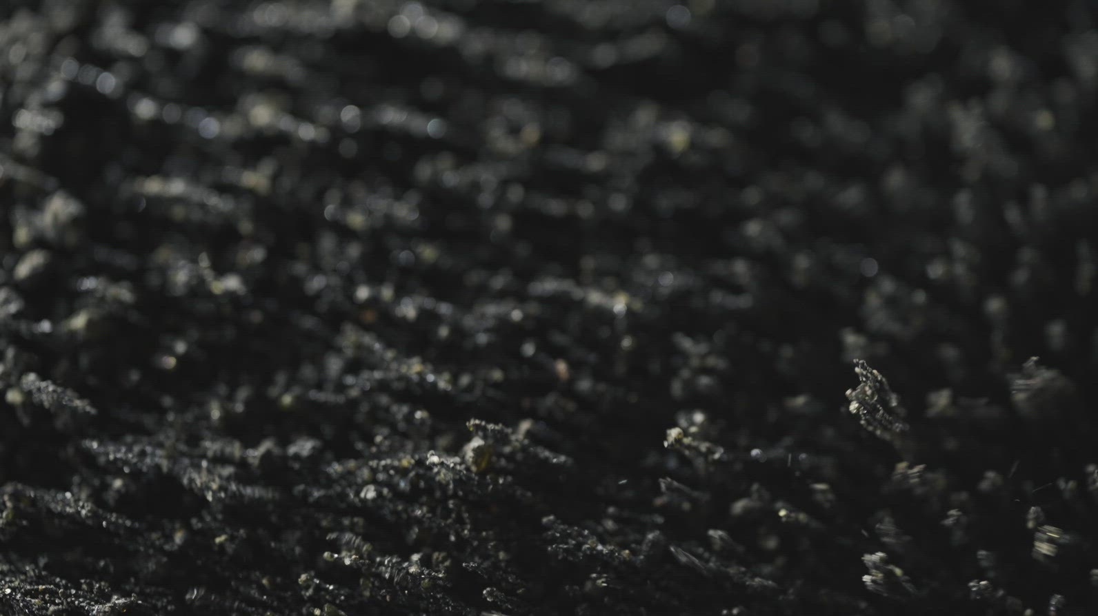 Black Volcanic Particles Moving With Magnetic Field